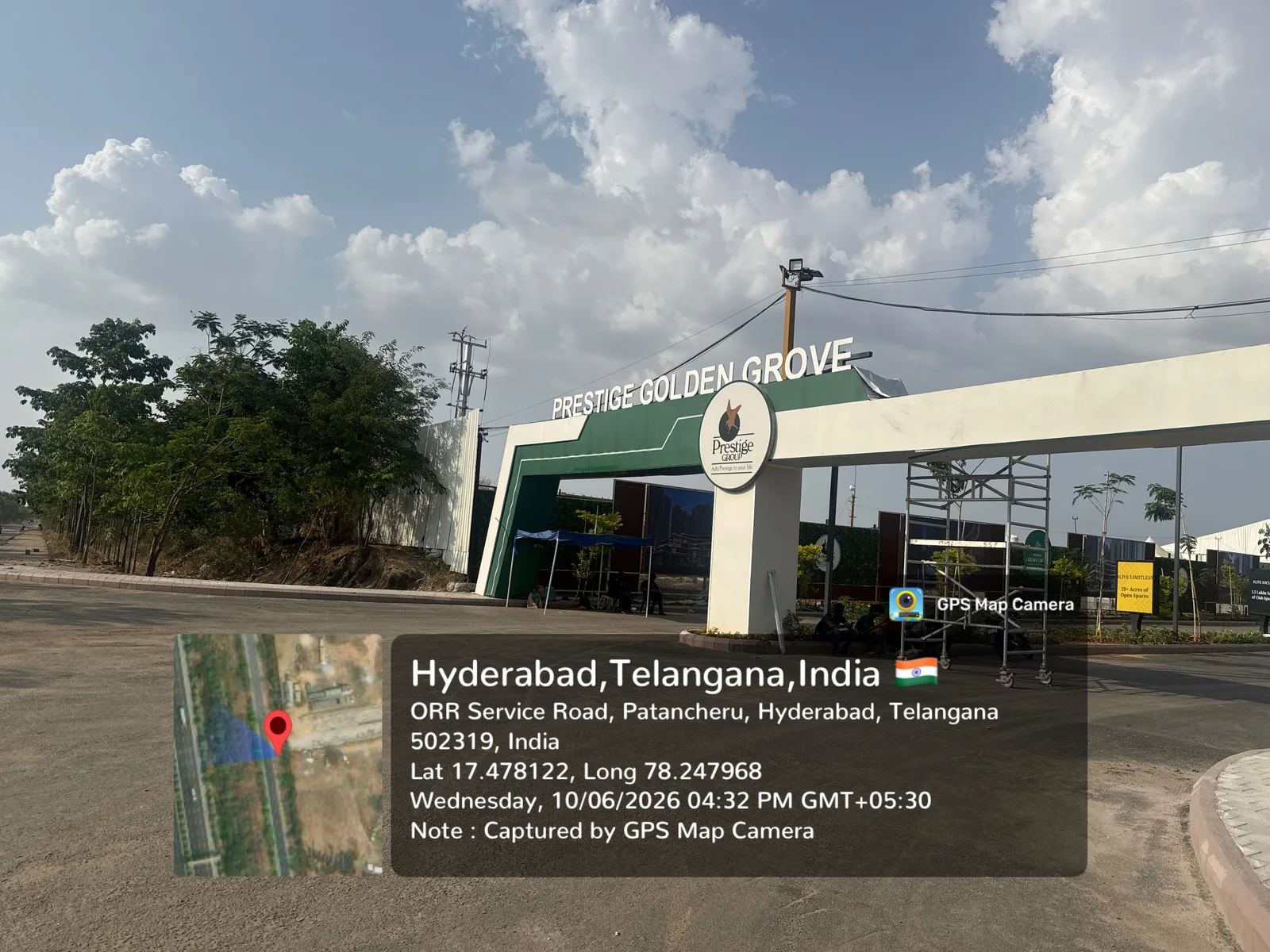 The grand entrance archway at Prestige Golden Grove on the ORR Service Road, Velimela, June 2026.