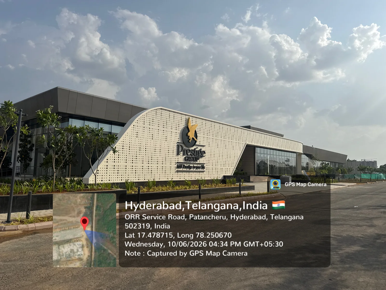 The completed Prestige experience centre / sales gallery at Prestige Golden Grove, Velimela, June 2026.