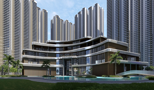 High-angle aerial view of Prestige Golden Grove residential towers and the grand entry driveway with landscaped borders.