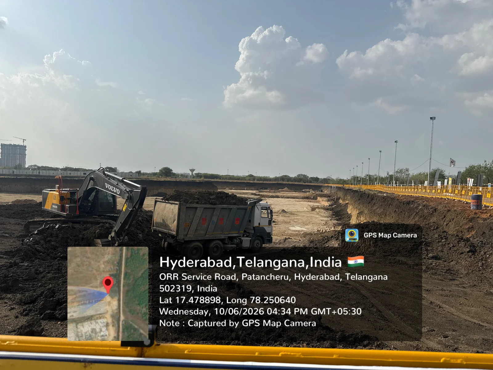 Wide foundation excavation pit at the 28.7-acre Prestige Golden Grove site with earth-moving machinery, June 2026.