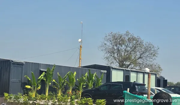 Exterior view of the modern container-style site office at Prestige Golden Grove development.